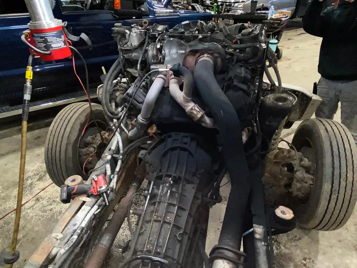 Diesel engine pulled from chassis for overhaul